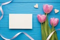 Flat lay top overhead view photo image of beautiful tulips little hearts paper card with empty blank mock up space for text design