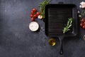 Flat lay top view black cast iron skillet Royalty Free Stock Photo