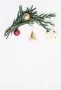 Flat lay top view Christmas border frame made of fir branches, toys and gifts Royalty Free Stock Photo