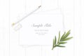 Flat lay top view elegant composition paper plant tarragon leaf and pencil eraser on wooden background