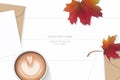 Flat lay top view elegant white composition letter kraft paper envelope autumn maple leaf and coffee on wooden background