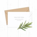 Flat lay top view elegant white composition letter kraft paper envelope tarragon leaf and taag on wooden background