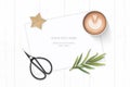 Flat lay top view elegant white composition paper yellow pencil star craft coffee tarragon leaf and vintage metal scissors on