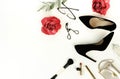 Flat lay, top view female black high heels shoes, accessories and make up cosmetics