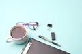 Flat lay top view modern office desk Workspace with blank clip board, eye glasses, office supplies, pen,and coffee cup on light Royalty Free Stock Photo