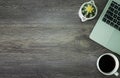 Flat lay, Top view of Office desk wooden table with laptop and white cup of black coffee. Royalty Free Stock Photo