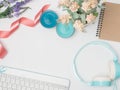 Flat lay, top view office table desk frame. feminine desk workspace with laptop, watch on white background.Love concept top view Royalty Free Stock Photo