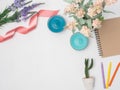 Flat lay, top view office table desk frame. feminine desk workspace with laptop, watch on white background.Love concept top view Royalty Free Stock Photo