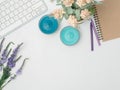 Flat lay, top view office table desk frame. feminine desk workspace with laptop, watch on white background.Love concept top view Royalty Free Stock Photo