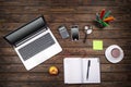 Concept freelancing, business concept, office table desk, laptop, empty notebook, cup of coffee, smartphone, calculator, wooden ba Royalty Free Stock Photo