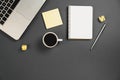 Flat lay, top view office table desk. Office supplies, pen, notepad, laptop, cup of coffee on grey background. Blog concept. Royalty Free Stock Photo
