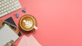 Flat lay, top view office table desk. Workspace with blank clip board, keyboard, office supplies, pencil, green leaf, and coffee c Royalty Free Stock Photo