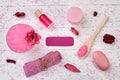 Flat lay top view pink spa stuff on white wood. Royalty Free Stock Photo
