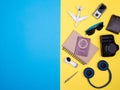Flat lay top view of traveler photographer accessories on yellow background Royalty Free Stock Photo