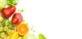 Flat lay top view tropical fruits frame background: grape, rose apple, orange, spinach, mango, pear, guava and banana. Healthy dri