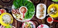 Lat lay or Top view of Vietnamese food with grilled pork sausage, many fresh vegetable Royalty Free Stock Photo