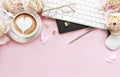 Flat lay top view women`s office desk with flowers. Female workspace with laptop, flowers peonies, accessories, notebook, glasses Royalty Free Stock Photo