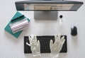 Flat lay, Top view work form home and COVID-19 prevention concept on office table desk, Laptop computer with clean gel Royalty Free Stock Photo