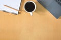 Flat lay, Top view work space in office.  with laptop, notebook, pencil white coffee cup on wooden Table. Royalty Free Stock Photo