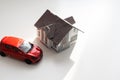 flat lay toy car, toy house, keys and money on the table Royalty Free Stock Photo