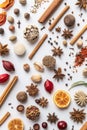 Flat lay with a variety of aromatic spices, dried oranges, and flavorful herbs Royalty Free Stock Photo