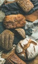 Flat-lay of various bread loaves on grey background, top view Royalty Free Stock Photo