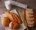 Flat lay various breads with milk and news paper Royalty Free Stock Photo