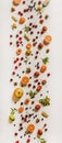 Flat-lay of various summer fruits and berries, vertical composition