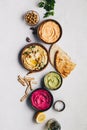 Flat-lay of Various Vegetarian dips hummus