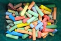 Flat lay view of Coloured chalks in a box Royalty Free Stock Photo