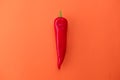 Flat lay view of hot red chili peppers. Food background. Copy space. Bright red orange background. Design banner. Royalty Free Stock Photo