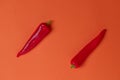 Flat lay view of hot red chili peppers. Food background. Copy space. Bright red orange background. Design banner. Royalty Free Stock Photo