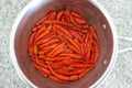 Flat lay view of hot red chillies cooked in a metal pot Royalty Free Stock Photo