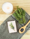 Flat lay view Juniper latin Juniperus communis berry soap bar  juniper tree branch with confier cones. Royalty Free Stock Photo