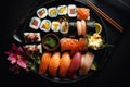 Flat lay view of a platter of Japanese sushi and sashimi. Royalty Free Stock Photo