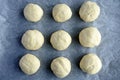 Flat lay view of round pieces of Bread Rolls dough Royalty Free Stock Photo
