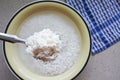 Flat lay view of spoon full of white rice Royalty Free Stock Photo