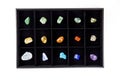 Flat lay view of variety of colorful semi precious stones crystals in organizer box. Royalty Free Stock Photo