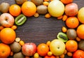 Flat lay view of various fruits frame background. Room for text in the center.