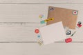 Flat lay view of white card and envelope decorate with love stickers on white background. Happy concept and love photo for wallpap