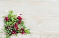 Flat lay wild berry red ripe lingonberry, Cowberry, foxberry, cranberry on wooden background.