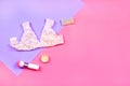 Flat lay of woman lingerie, bracelet and cosmetics. Royalty Free Stock Photo