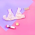 Flat lay of woman lingerie, bracelet and cosmetics. Royalty Free Stock Photo