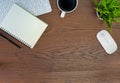 Flat lay, Workplace office desk table. View from above with keyboard, computer mouse and pen, notebooks and cup of black coffee on Royalty Free Stock Photo