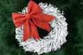 Flat lay with wreath on green rug background Royalty Free Stock Photo