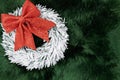 Flat lay with wreath on green rug background Royalty Free Stock Photo