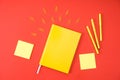 flat lay with yellow notebook with supplies Royalty Free Stock Photo