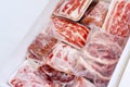 Flat layout of red meat package stacks in a box Royalty Free Stock Photo