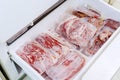 Flat layout of red meat packages in a storage room Royalty Free Stock Photo