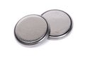 Flat lithium round button cell battery isolated Royalty Free Stock Photo